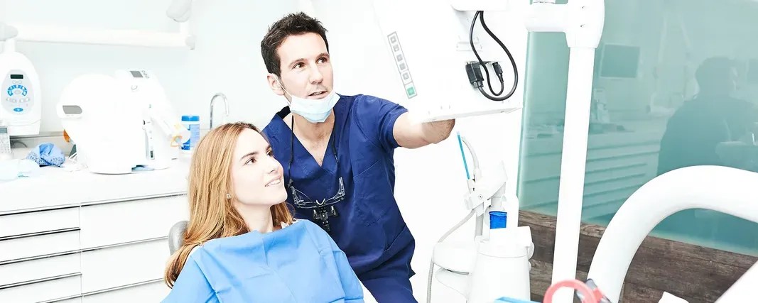 Dentist caring for a patient in a modern dental office